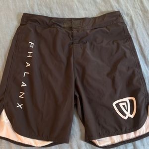 Phalanx fight shorts, size 32 with Velcro and tie closure.